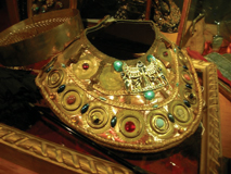 Cleopatra collar for the Globe Shakespeare production. Leather, Play-doh and gold paint!: WECS visit behind the scenes at Cosprop. [Photo: Jill Hazell]